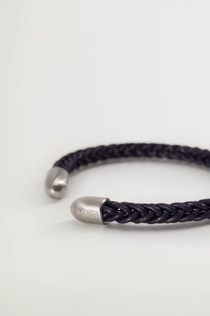 Dark navy braided bracelet with silver clasp and end caps