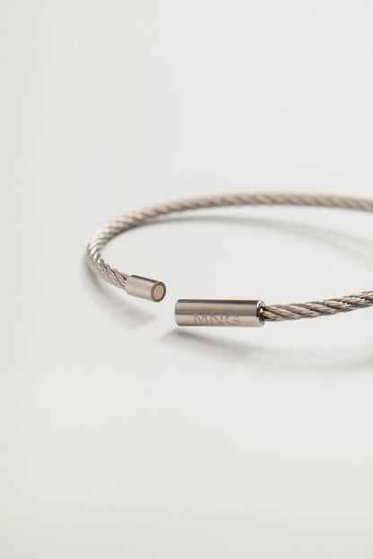 Braided cord bracelet with silver-tone clasp and metal end caps