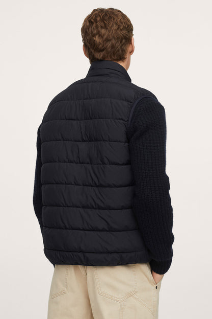 Dark navy puffer jacket back view, horizontal quilting and rib-knit cuffs