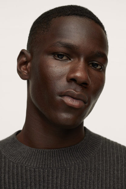 Charcoal crewneck sweater close-up, ribbed knit at neckline