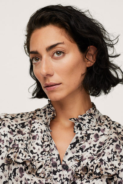 MANGO ecru floral blouse detail: ruffled collar and button placket