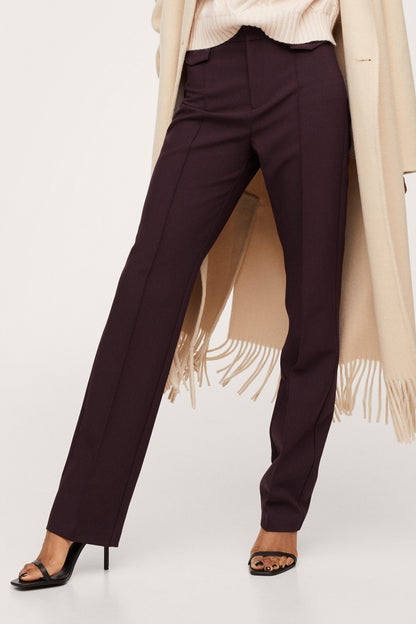 Dark maroon ankle-length tailored trousers with straight leg and center crease
