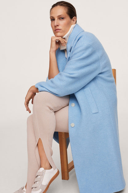 Sky blue long coat draped shoulder with stand collar and button detail