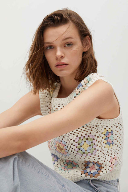 Ecru crochet sleeveless sweater vest with multicolor speckled pattern