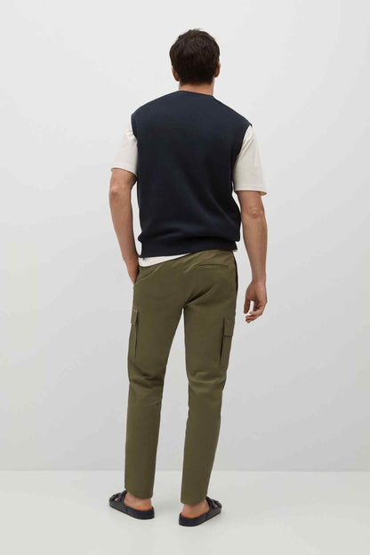 Men's navy sleeveless V-neck knit sweater vest, back view over white T-shirt