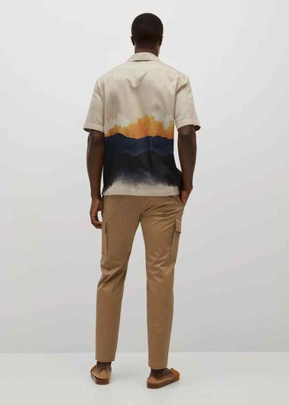 MANGO sand short-sleeve shirt back view with orange and blue abstract landscape print