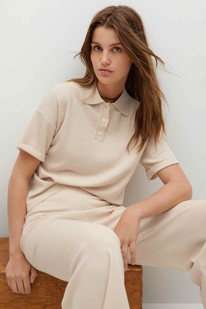 Ecru knit polo with collar and buttons, matching wide-leg culotte pants