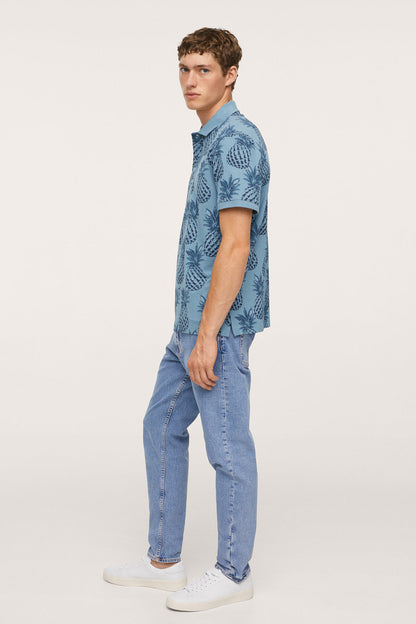 Blue patterned short-sleeve button-up shirt, side view