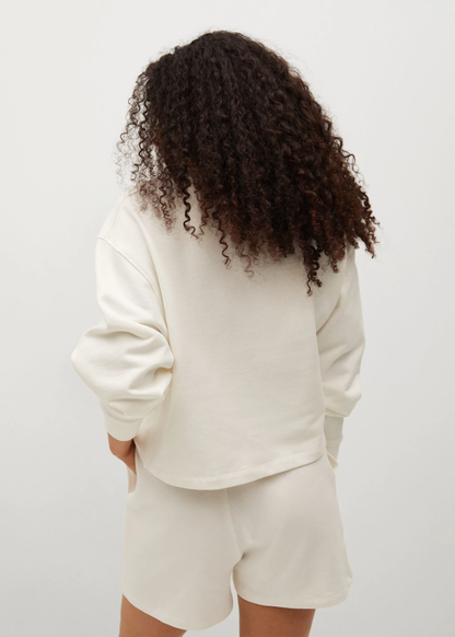 White sweatshirt and shorts set, back view with long sleeves and relaxed fit