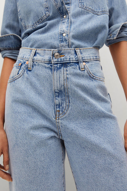 Light blue denim high-waist jeans with belt loops and metal button