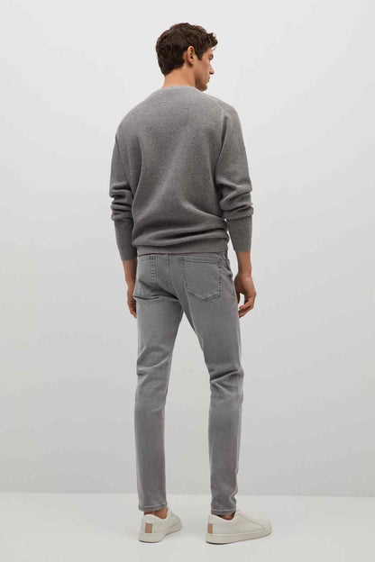 Gray denim jeans from back view, 5-pocket styling