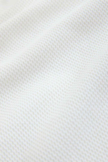 Ecru textured knit fabric from the T-shirt