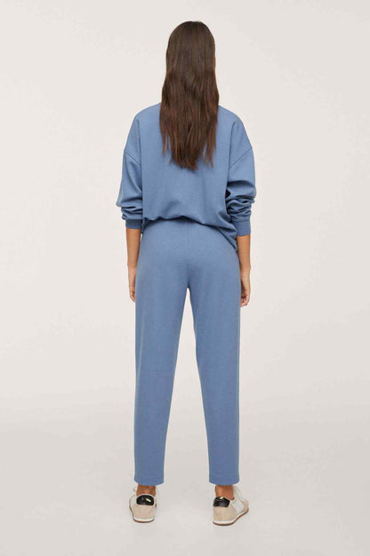 Blue matching sweatshirt and jogger pants set, back view