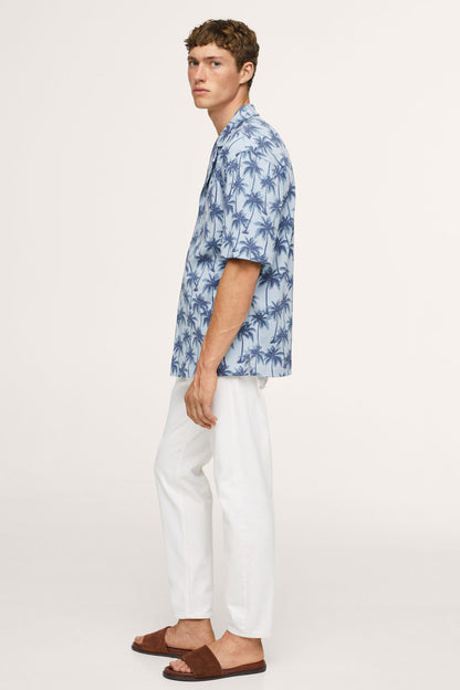 Men’s sky blue palm-print short-sleeve button-up shirt, side profile