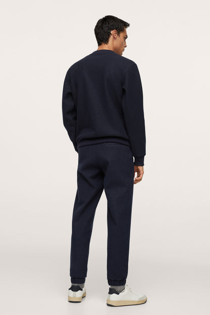 Men's dark navy crewneck sweatshirt with matching jogger pants