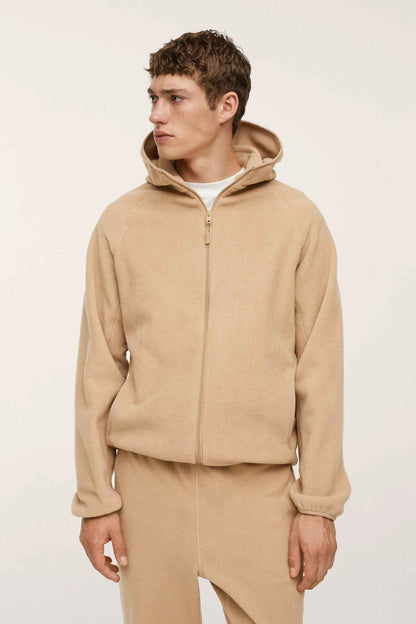Beige zip-up hoodie with matching jogger pants set, hood and front zipper.