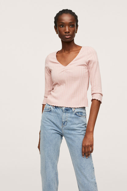 Pastel pink V-neck ribbed blouse with gathered sleeves and ruched neckline