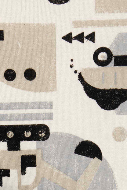 White long-sleeve bodysuit with robot graphic print and snap-button close