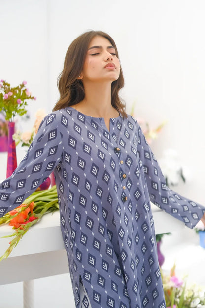 Blue patterned long tunic with button-front and crew neckline, loose 3/4 sleeves