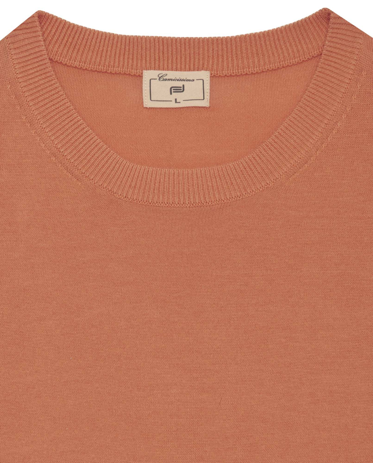 Orange crewneck knit sweater neckline close-up with brand label