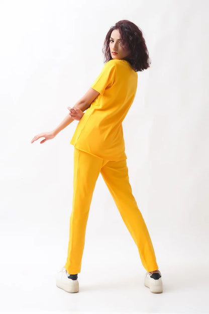 Dhaga yellow T-shirt and pants set, short-sleeve top with side profile view