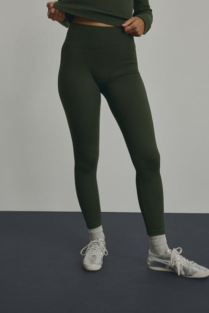 Forest green high-waist leggings, full-length with ribbed texture