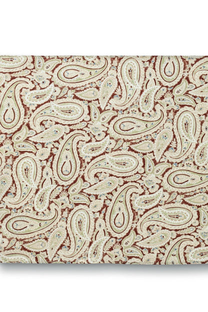 Paisley pocket square with wide patterned border, cream and rust paisley motifs
