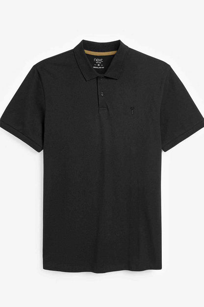 Black polo shirt with collared button front and short sleeves, flat lay