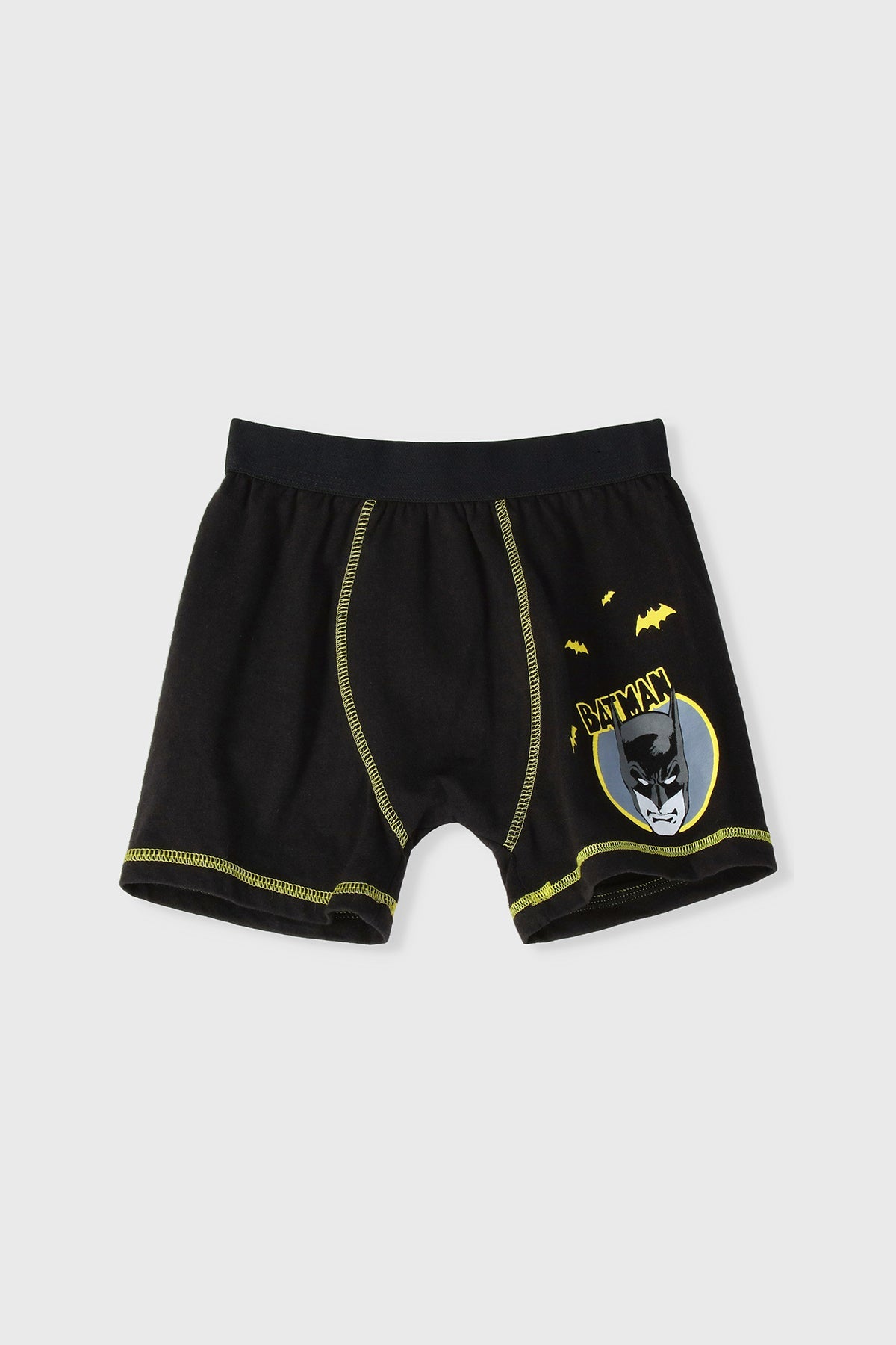 Boys' black Batman shorts with yellow stitching, drawstring waistband, shield emblem