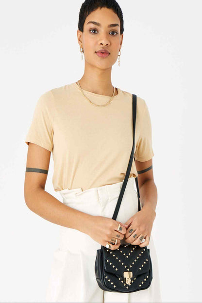 Black studded crossbody bag with flap and gold-tone lock