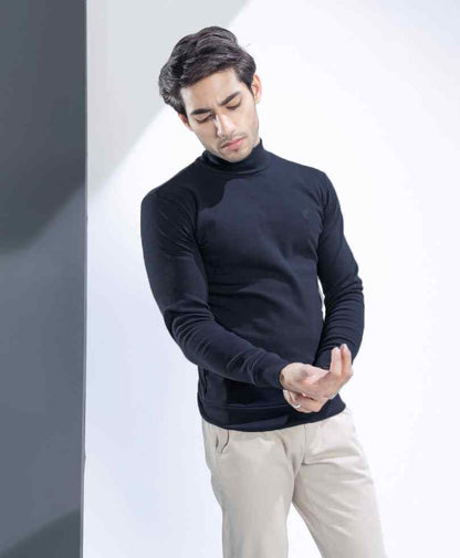 Fitted black long-sleeve turtleneck top, mock neck with snug sleeves