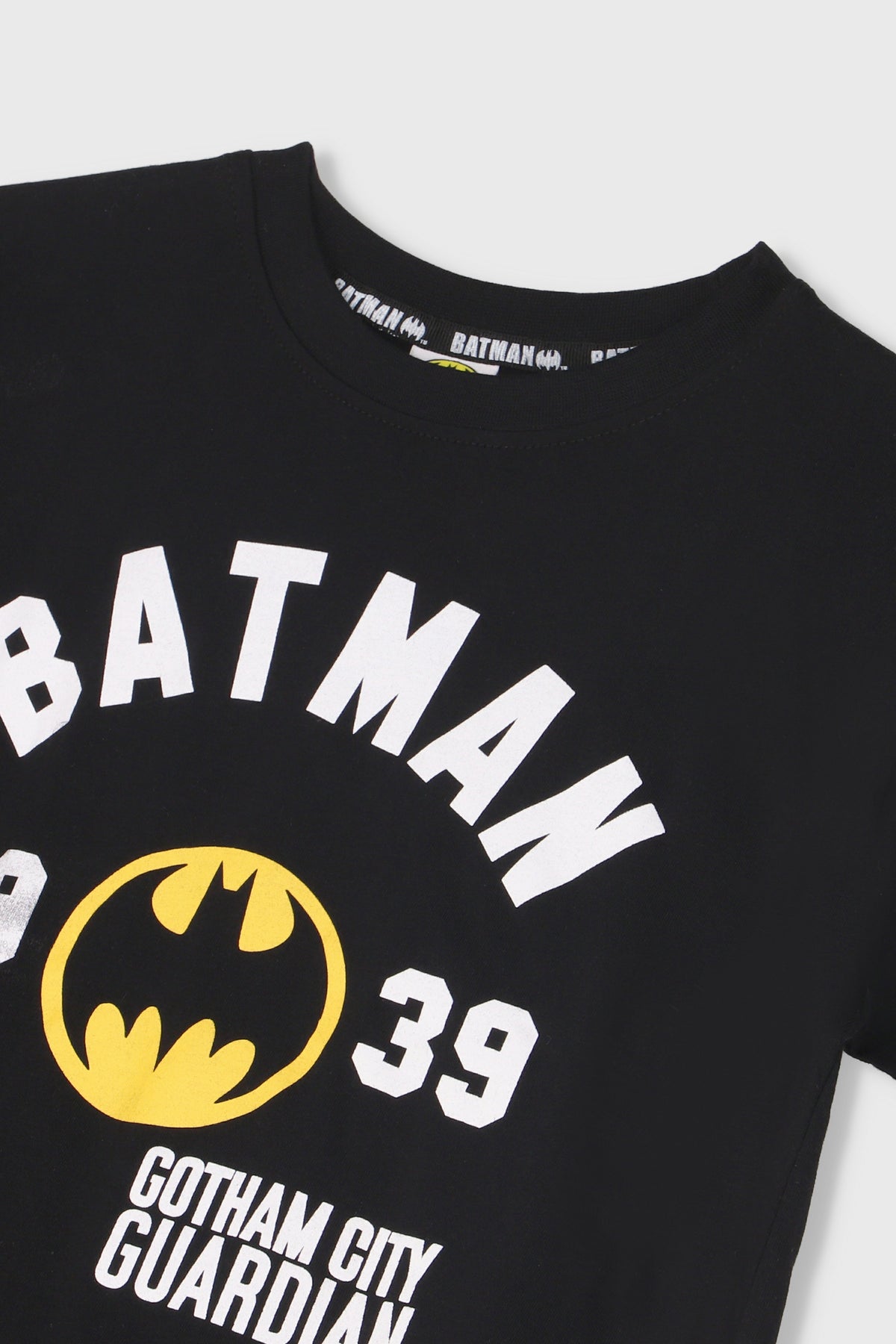 Black Batman short-sleeve T-shirt with big circular logo, '39', and 'Gotham City Guardian'.