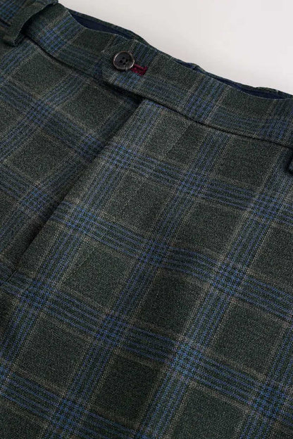 Green plaid suit trousers close-up of waistband and interior label