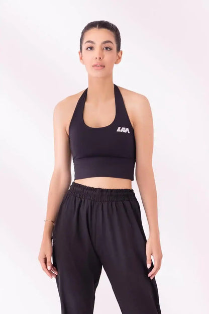 Black halter sports bra with small logo patch