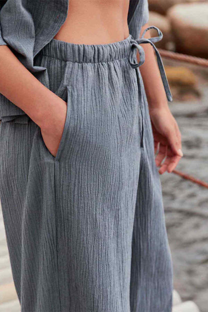 Slate grey elastic-waist wide-leg pants with drawstring tie