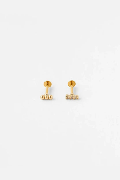 Gold tone stud earrings with small ball charm cluster