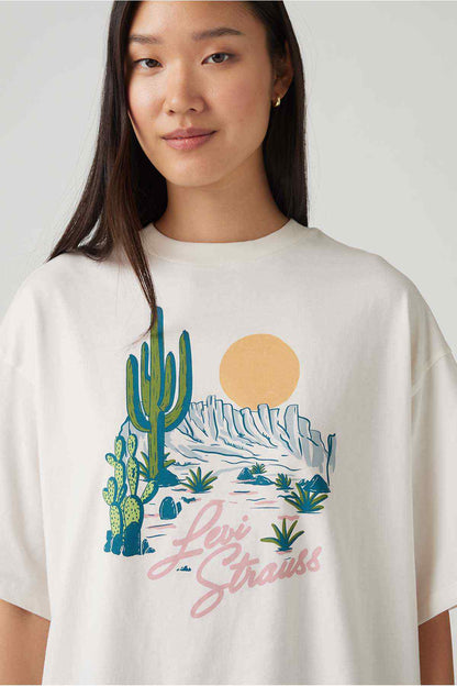 White graphic T-shirt close-up of cactus, desert waves and script text
