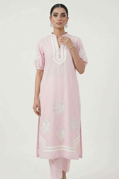 Light pink kurta with white-trim placket and embroidered motifs along the front