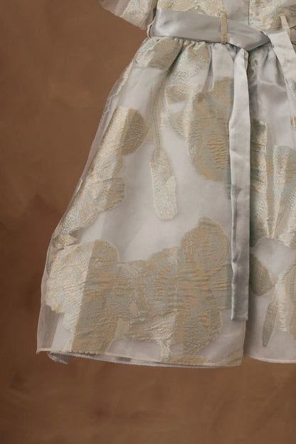 Licci girls cream dress with gold animal print, flared skirt and tied sash belt