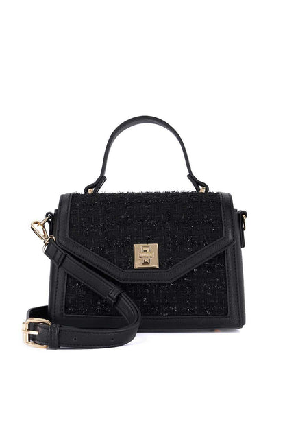 Black mini structured handbag with top handle, flap clasp, and crossbody strap