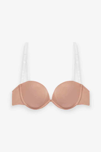 Nude pink molded underwire bra cups with adjustable straps, front view