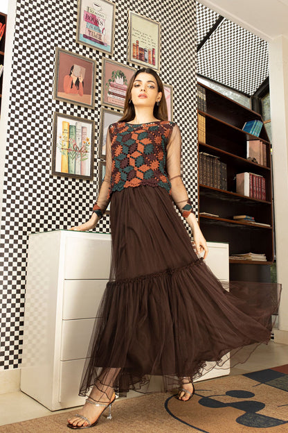Brown tiered maxi dress with geometric sleeveless bodice and flowing tiered skirt