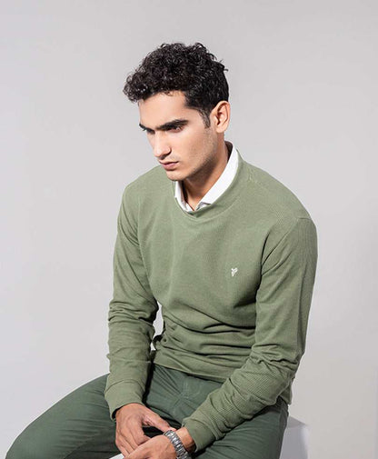 Men's fitted olive-green crewneck knit sweater with long sleeves and small logo