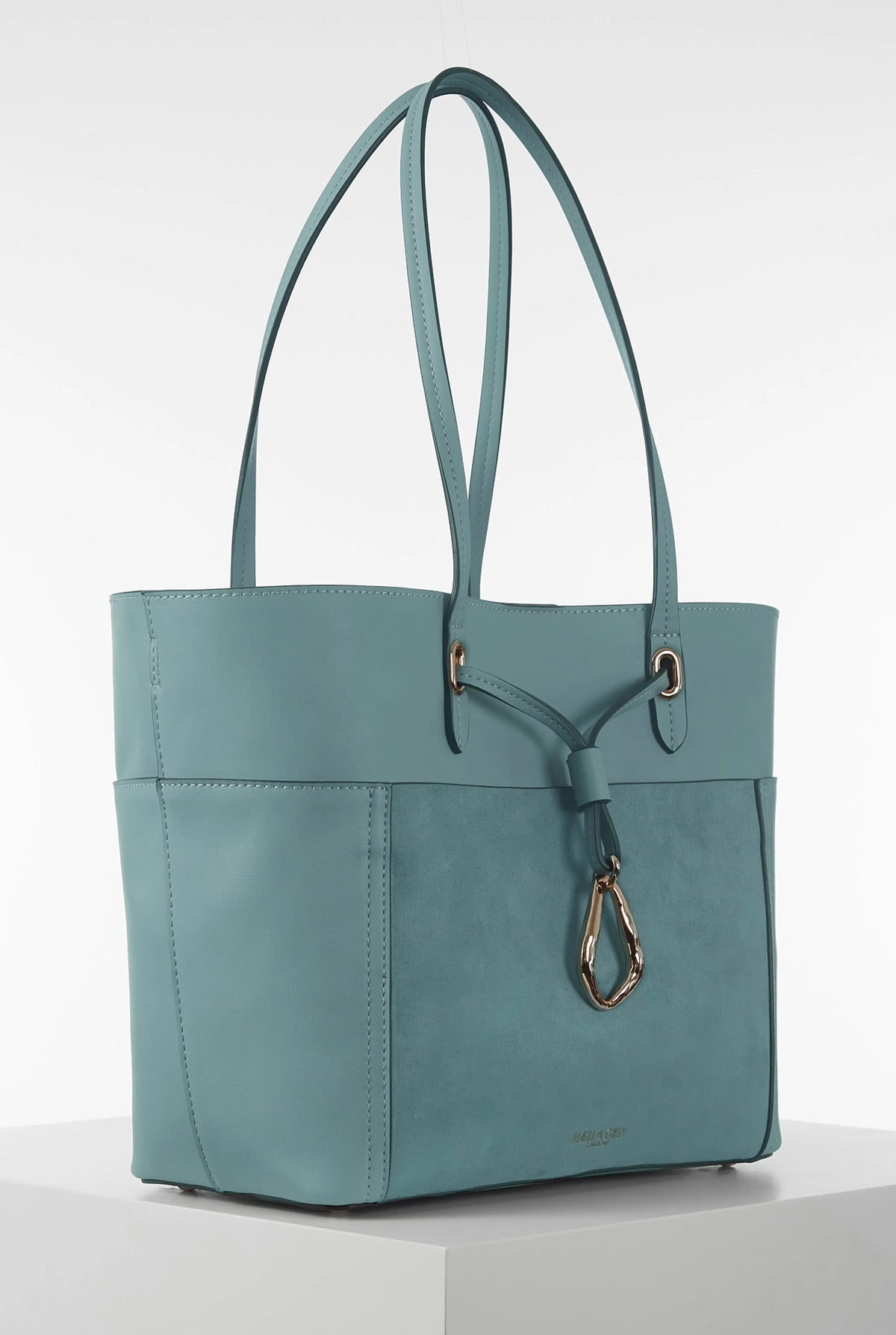 Luella blue tote bag angled view, top handles and hanging key charm