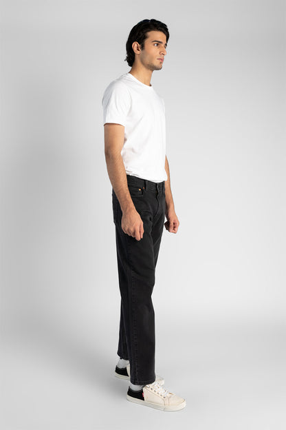 Levi's charcoal straight-leg jeans, side view with belt loops and cuffs