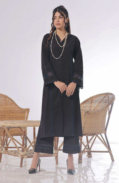Black long tunic with lace cuffs and matching pants, full-body front pose
