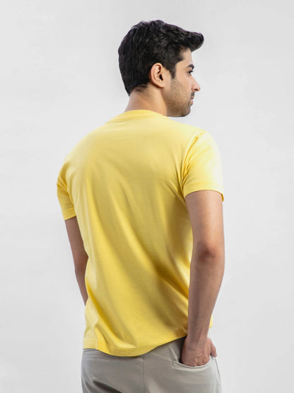Yellow cotton crew-neck T-shirt, plain back view.