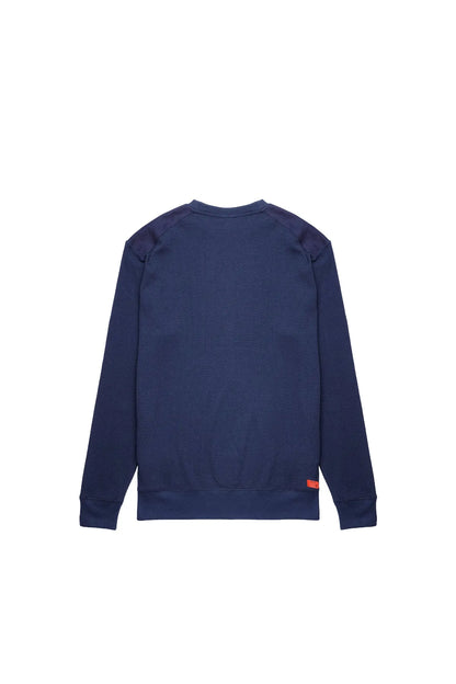 Dark blue Diesel crewneck sweatshirt, back view with small orange logo tag