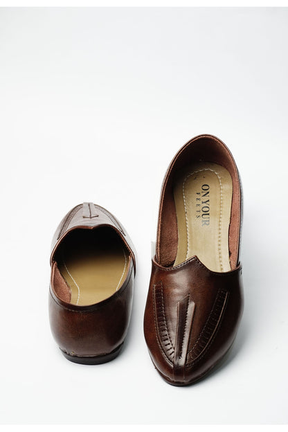 Brown leather slip-on loafers, rear view with tan lining and heel