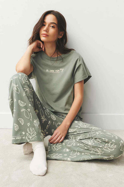 Sage green lounge set with short-sleeve T-shirt and patterned pajama pants